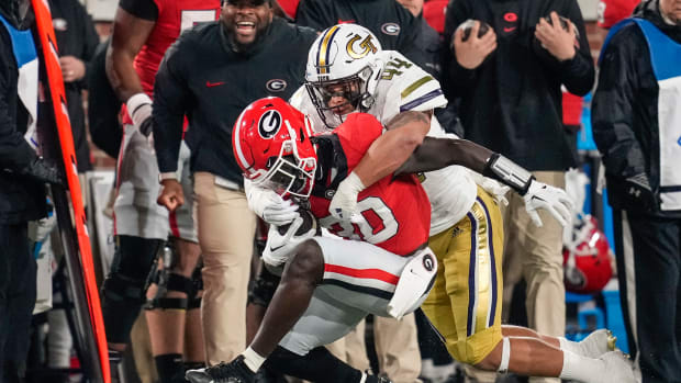 Kyle Efford tackles Daijun Edwards